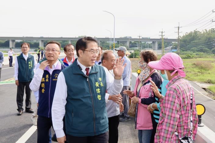 官田溪菩提橋改建完工通車  改善淹水困境並促進產業觀光...